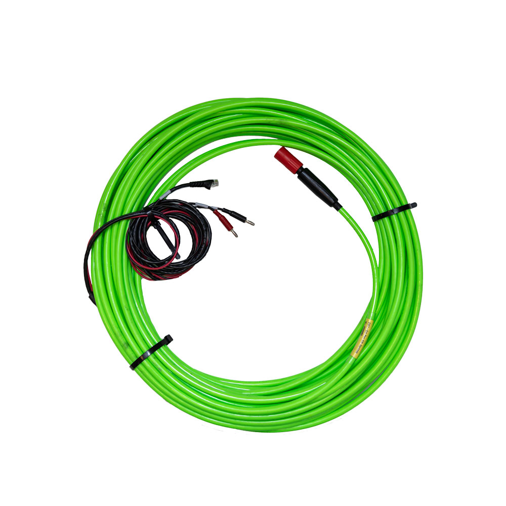 Coiled green underwater cable for Subnero acoustic smart modems with a red connector and power breakout leads