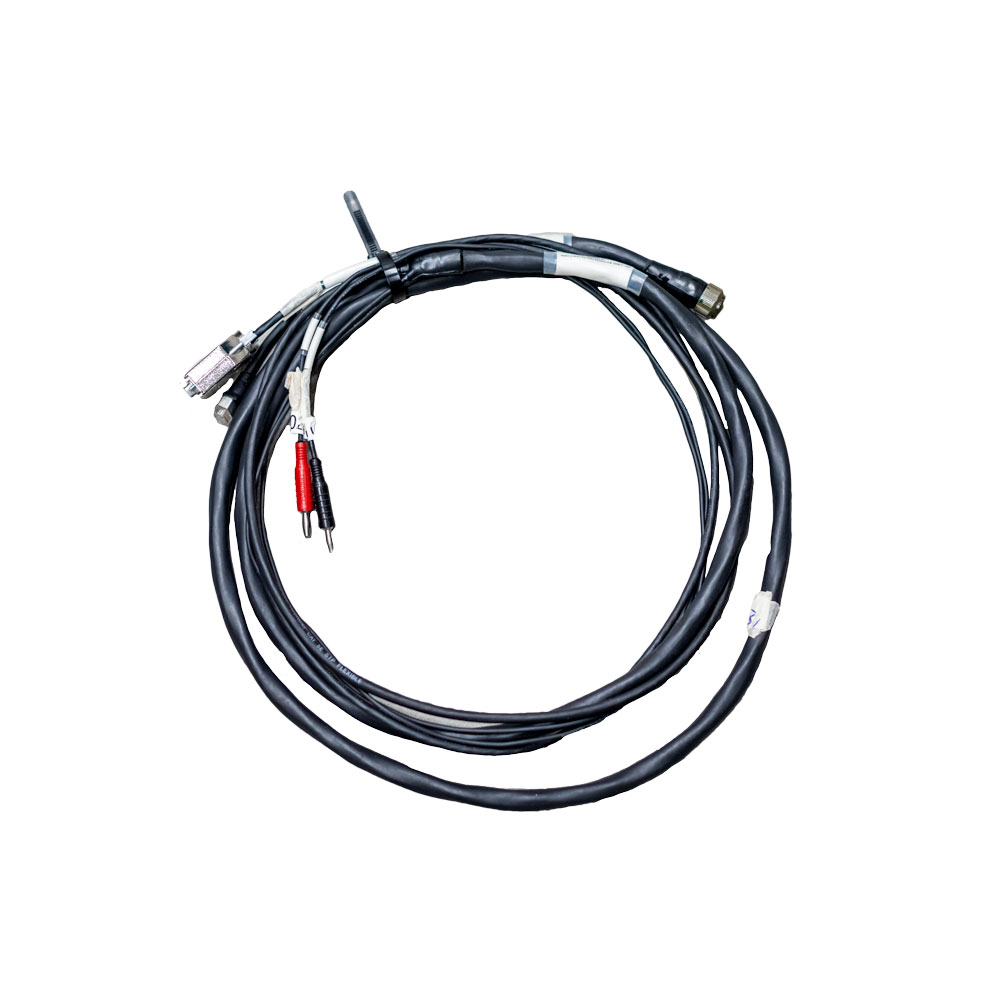 Coiled black underwater cable for Subnero acoustic smart modems with multiple connector breakouts for power and data