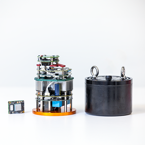 Disassembled Subnero L12L Series Silver Edition modem showing its internal electronics stack, processing board, and pressure housing components